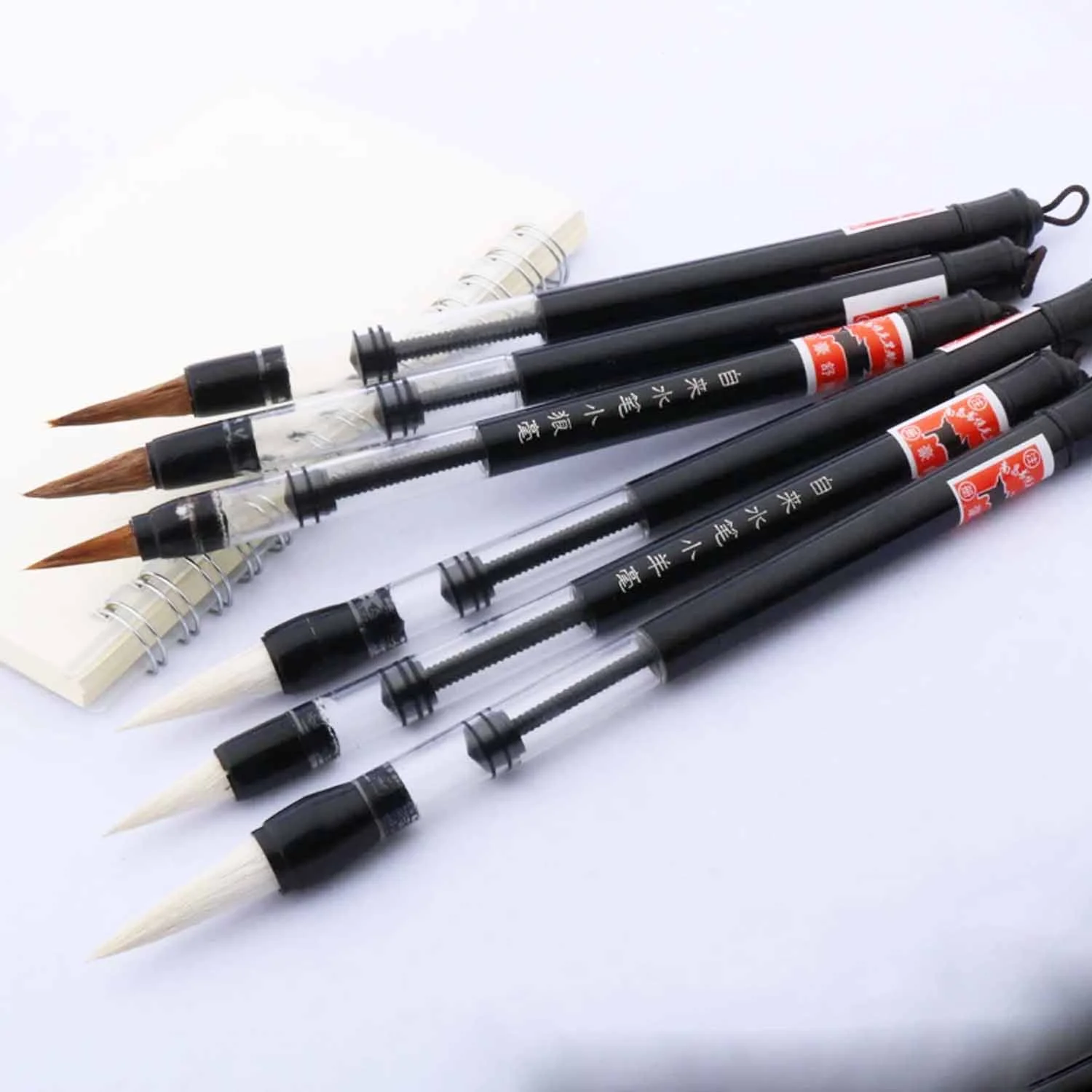 Pincel de agua recargable tipo piston pelo de comadreja y lana surtido 1ud